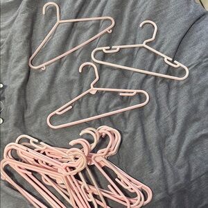 Set of Pink Plastic Hangers